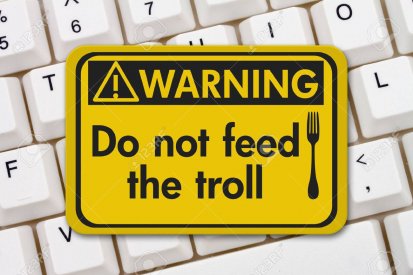 74544018-feeding-the-troll-warning-sign-a-yellow-warning-sign-with-text-do-not-feed-the-troll-...jpg